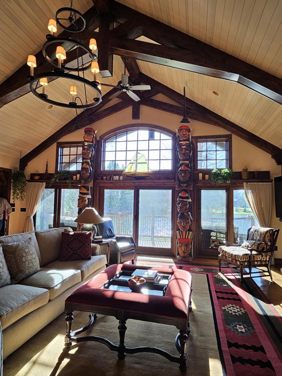 Larger-than-life totems are among the unusual décor in the great room of this rustic residence on the 2024 Tour of Distinctive Homes.