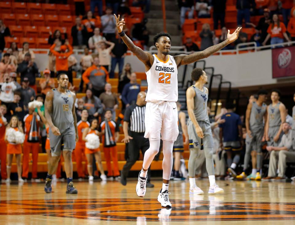 Oklahoma State's Kalib Boone (22) reacts the second half during the college basketball game between Oklahoma State University Cowboys and the West Virginia Mounteers at , Monday, Jan.2, 2023. OSU won 67-60.