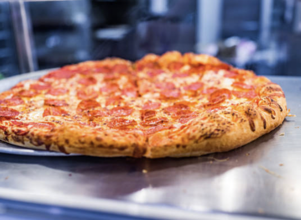 大家印象中，正常的披薩應該是長這樣的。（示意圖／Pexels）