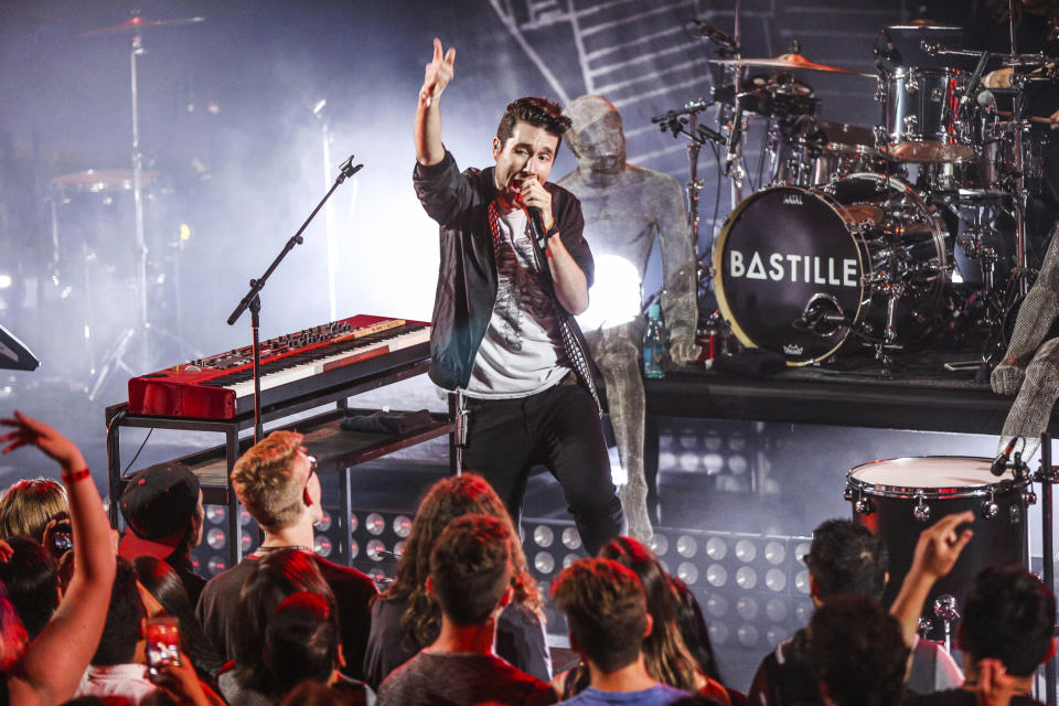 FILE - In this Sept. 6, 2016, file photo, Dan Smith of Bastille performs at the iHeartRadio Album Release Party with Bastille at the iHeartRadio Theater in Burbank, Calif. Christina Aguilera will perform live minutes before the ball drops to usher in 2019 in New York’s Times Square on “Dick Clark’s New Year’s Rockin’ Eve with Ryan Seacrest.” Dick Clark Productions announced on Thursday, Dec. 13, 2018, Aguilera will be joined by Bastille, Dan and Shay and New Kids On The Block leading up to the countdown. (Photo by Rich Fury/Invision/AP, File)
