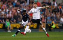 Soccer Football - Championship - Millwall v Fulham - The Den, London, Britain - April 20, 2018 Millwall's Mahlon Romeo in action with Fulham's Kevin McDonald Action Images/Matthew Childs