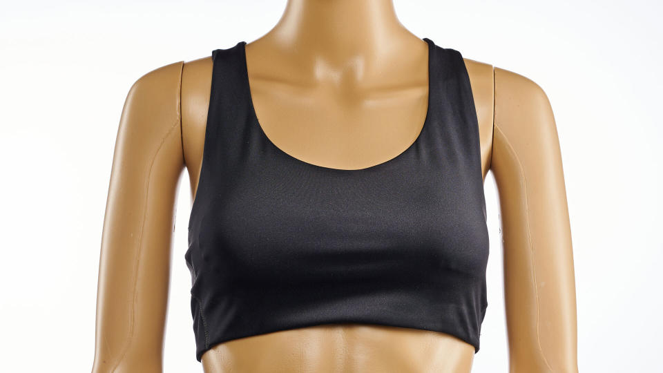 Mannequin wearing black sports bra