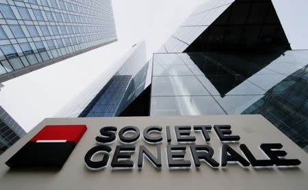 The logo of the French bank Societe Generale is seen in front of the bank's headquarters building at La Defense business and financial district in Courbevoie near Paris, France, April 21, 2016. REUTERS/Gonzalo Fuentes