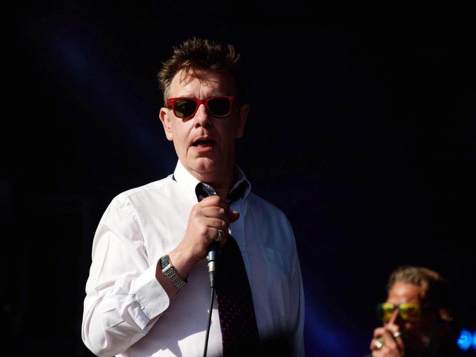 Jake Black, a member of the band Alabama 3 and the co-writer of The Sopranos theme tune, has died. The musician had taken ill after a performance at Highpoint Festival in Lancashire on Friday, 17 May and was admitted to hospital. He died on Tuesday, 21 May and was thought to be in his late 50s. The news was broken on the band’s Facebook page, in a statement that read: “Early this afternoon, on a beautiful summer’s day, our friend, comrade and spiritual teacher, Jake Black AKA The Very Reverend D Wayne Love, passed over to the higher ground.”“After a magnificent performance at the Highpoint Festival in Lancashire, DWayne in his supreme wisdom, decided it was the appropriate moment for his ascension into the next level. The transition was painless and peaceful. He was surrounded by brothers Larry Love, LB Dope, The Spirit, Jonny Jamm and Sister Therese Mullan.”“We are heartbroken,” the statement continued. “All that remains for us, at this moment, is to carry out his precise instructions regarding the continuation of his teachings as a First Minister of The Presleyterian Church of Elvis The Divine, and continue The Great Work. His last words, which we have yet to decipher, were ‘Tweet Tweet, Possil Fleet’.”Born in Glasgow, Black formed the Alabama 3 alongside Rob Spragg in Brixton, London in 1995, crafting a fusion of the country, blues and acid house genres. They first started out as the First Presleyterian Church of Elvis the Divine, before changing their name to Alabama 3 and signing a record deal in 1997.Their biggest hit, “Woke Up This Morning”, about a woman who shoots her husband dead after years of abuse, was used for the opening credits of HBO’s The Sopranos, for which the band were reportedly paid $40,000. Their music has also been featured Gone in 60 Seconds, Football Factory, and Definitely, Maybe.