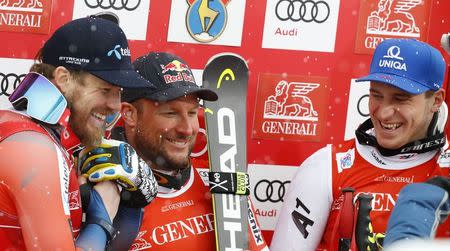 Alpine Skiing - FIS Alpine Skiing World Cup - Men's Alpine Super G - Kitzbuehel, Austria - January 19, 2018. Kjetil Jansrud of Norway, Aksel Lund Svindal of Norway and Matthias Mayer of Austria. REUTERS/Leonhard Foeger