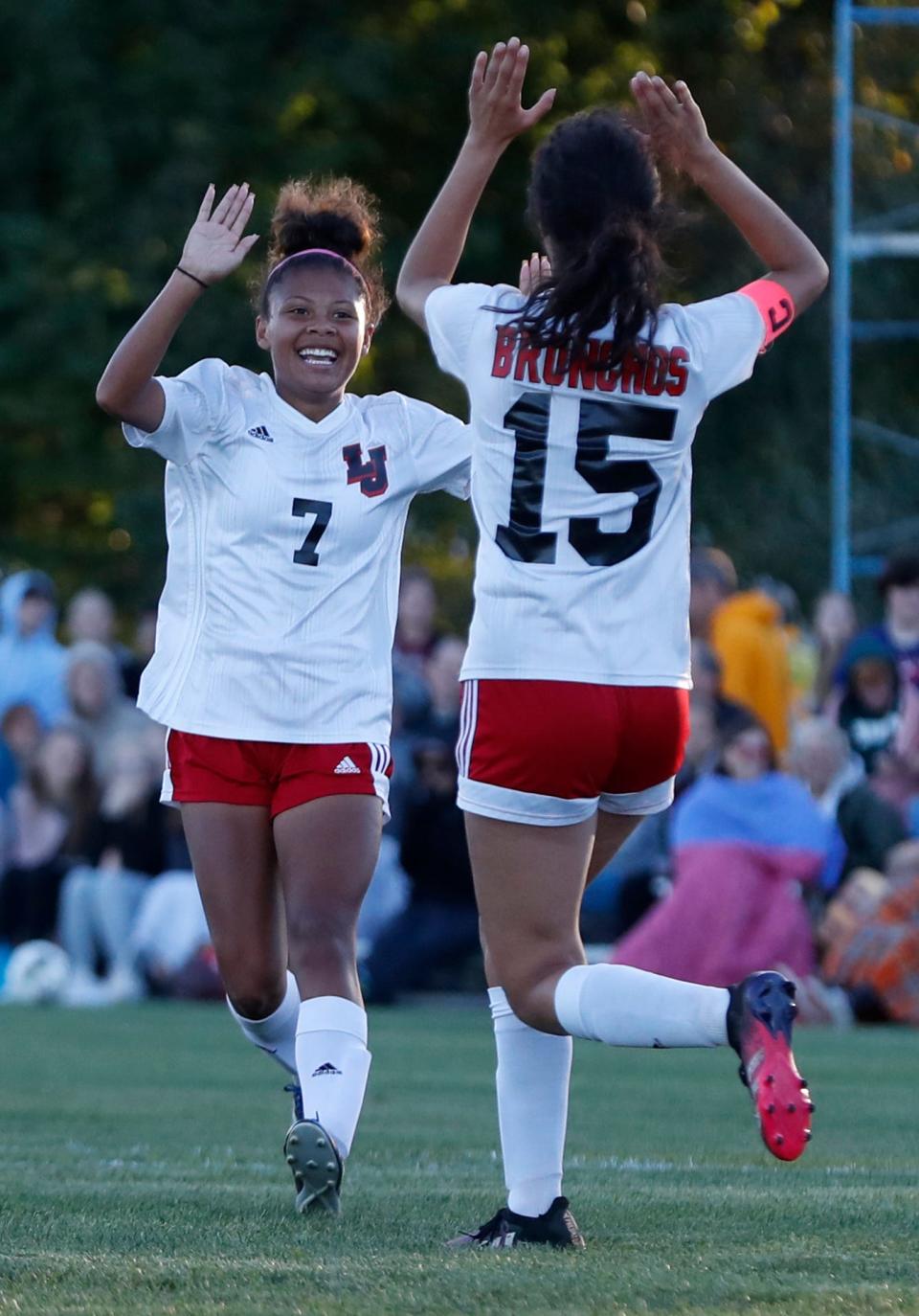 Lafayette Jeff Bronchos celebrate after scoring during the IHSAA girls soccer game against the Faith Christian Eagles, Thursday, Sept. 22, 2022, at Faith Christian High School in Lafayette, Ind.
