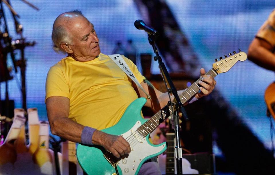 Jimmy Buffett and the Coral Reefer Band in concert at Raleigh, NC’s Walnut Creek Amphitheater Thursday night, April 21, 2016. Buffett and the band played Prince’s “Purple Rain” to honor the music icon who died earlier Thursday.