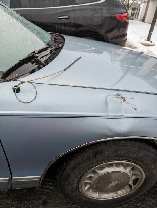 A photo from the woman who declined to be identified shows her car under the collapsed carport. (courtesy photo)