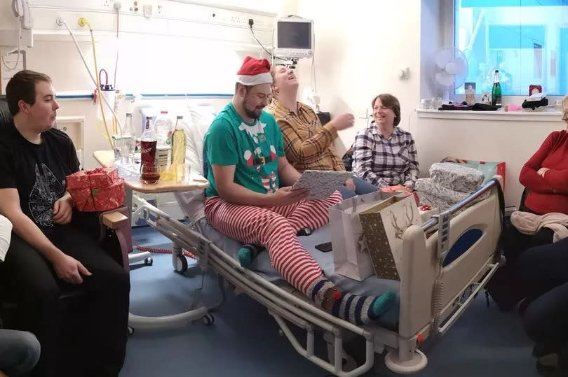 Chris with his family, his partner and her family on Christmas day in the Edinburgh Royal Infirmary