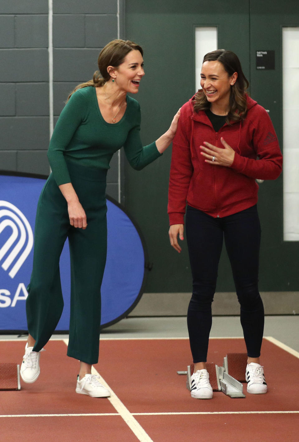 Britain's Catherine, Duchess of Cambridge (L), jokes with British athlete Jessica Ennis-Hill (R) during a SportsAid event at the London Stadium in east London on February 26, 2020. (Photo by Yui Mok / POOL / AFP) (Photo by YUI MOK/POOL/AFP via Getty Images)