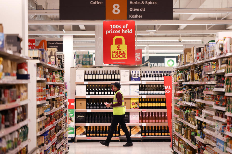 Sainsbury's A employee walks inside a Sainsbury’s supermarket in Richmond, west London, Britain, June 27, 2022.  Picture taken June 27, 2022. REUTERS/Henry Nicholls