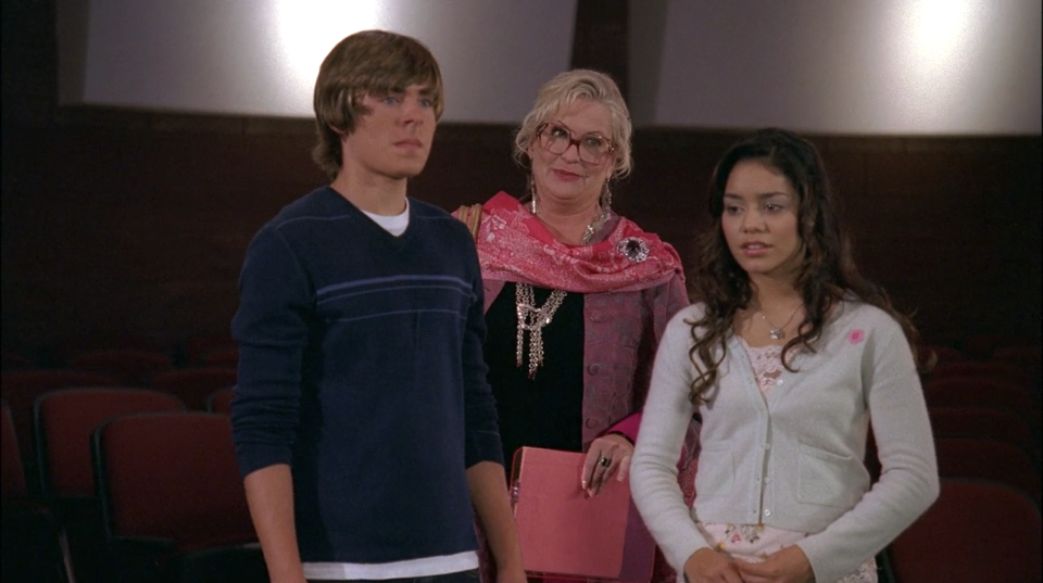 Zac Efron as Troy, Alyson Reed as Ms. Darbus, and Vanessa Hudgens as Gabriella in "High School Musical"