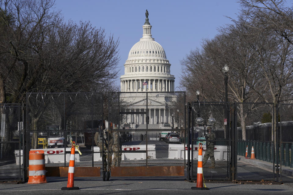 Security fencing surrounds Capitol Hill in Washington, Thursday, March 4, 2021. Capitol Police say they have uncovered intelligence of a "possible plot" by a militia group to breach the U.S. Capitol on Thursday, nearly two months after a mob of supporters of then-President Donald Trump stormed the iconic building to try to stop Congress from certifying now-President Joe Biden's victory. (AP Photo/Susan Walsh)