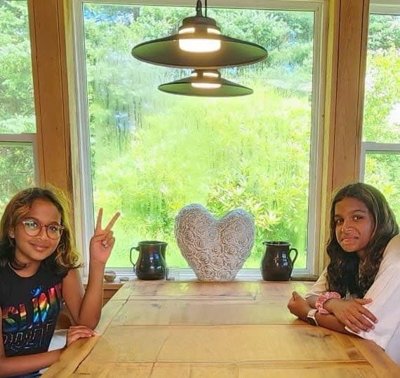 Isabel Ittybatta, 11, left, and her twin sister Sarah, live in Montreal and are trying to adjust to life without school.