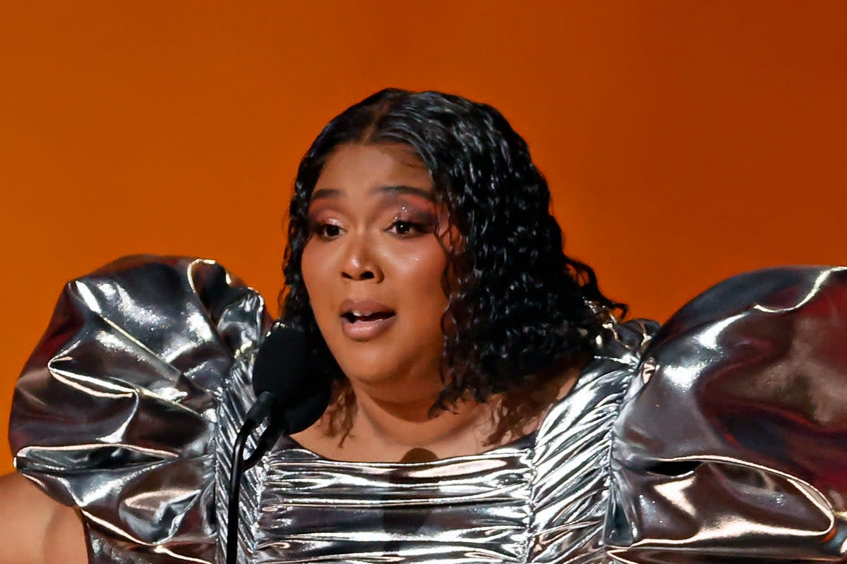 Lizzo accepting the Record Of The Year award for ‘About Damn Time’ at the Grammy Awards earlier this year (Getty Images)