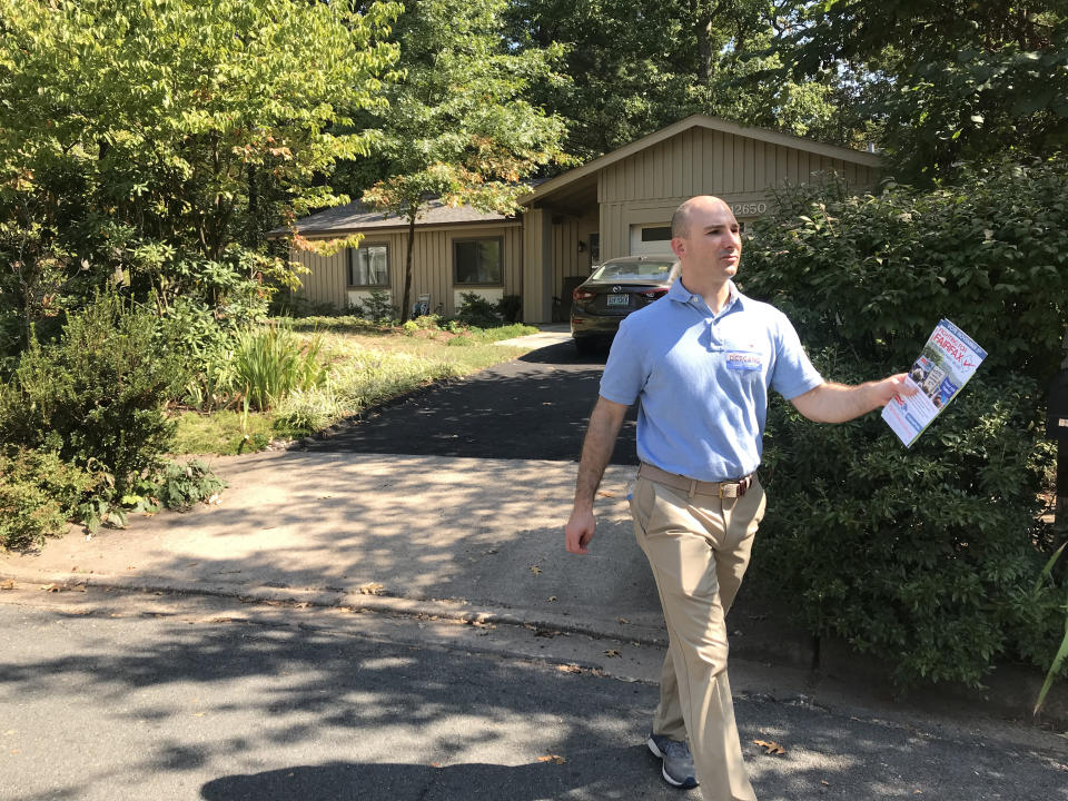 Steve Descano, the Democratic candidate for Fairfax County prosecutor, knocks on doors last month. (Photo: Ryan J. Reilly / HuffPost)