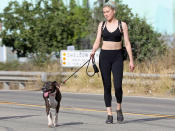 <p>Amber Heard takes her dog out for a hike on Tuesday.</p>