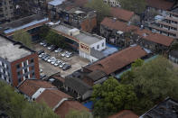 A view of the city of Wuhan is taken from a quarantine hotel in central China's Hubei province on Monday, March 30, 2020. Shopkeepers in the city at the center of China's virus outbreak were reopening Monday but customers were scarce after authorities lifted more of the anti-virus controls that kept tens of millions of people at home for two months. (AP Photo/Ng Han Guan)