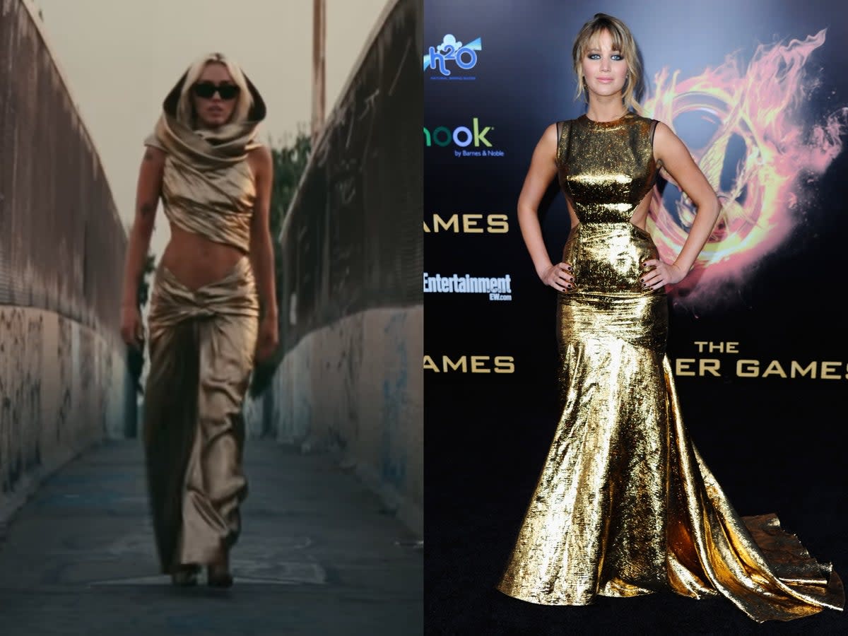 Miley Cyrus wearing a gold dress in the music video for her song “Flowers” that fans believe has a striking similarity to a gown worn by Jennifer Lawrence at the 2012 premiere of The Hunger Games (Getty/YouTube)