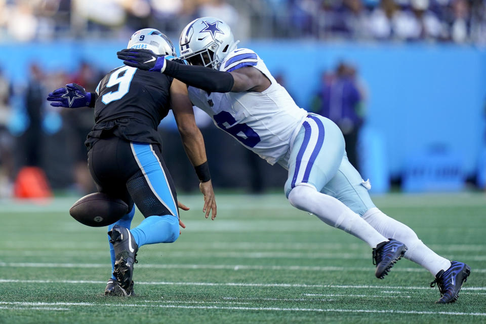 Dallas Cowboys safety Donovan Wilson recovered a fumble by Carolina Panthers quarterback Bryce Young during the second half of an NFL football game Sunday, Nov. 19, 2023, in Charlotte, N.C. (AP Photo/Erik Verduzco)