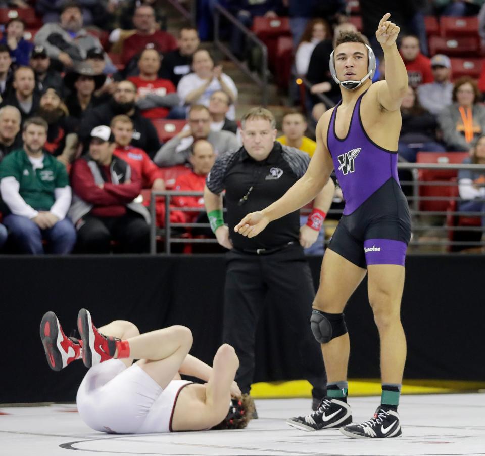 Waunakee's Reed Ryan reacts after defeating Kimberly's Brett Wittmann in a Division 1 220-pound semifinal match at the WIAA state individual wrestling tournament at the Kohl Center on Friday, February 22, 2019 in Madison, Wis.