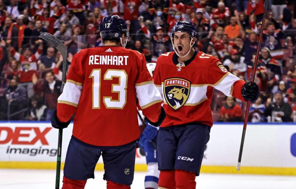 Florida Panthers left wing Mason Marchment (17) reacts after Panthers center Sam Reinhart (13) scores his first goal of the season during the first period of a NHL game against the Colorado Avalanche at the FLA Live Arena on Thursday, October 21, 2021 in Sunrise, Fl.