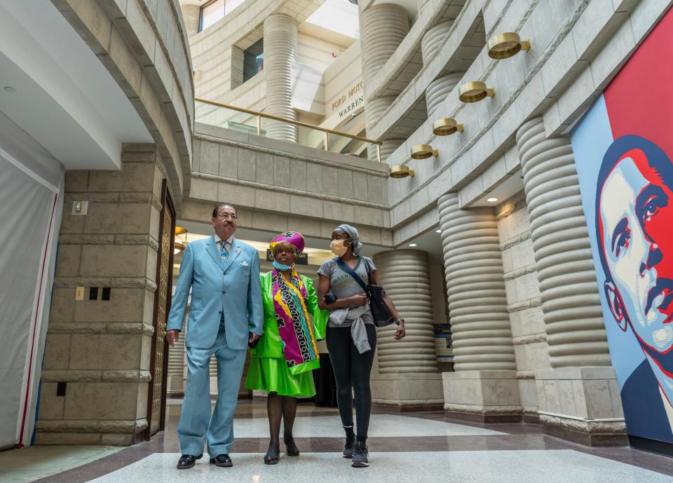 Retired judge Craig Strong, left, of Detroit, walks with his colleagues Barbara Mapson, of Detroit, and Khari Dickey, of Detroit, while heading to an exhibit to be photographed for the Detroit Free Press at the Charles H. Wright Museum of African American History in Detroit on Thursday, June 2, 2022. Strong's wardrobe is known across the city and country, as he has been photographed with many celebrities throughout the years. However, the charismatic Judge Strong has always had a serious side rooted in charity and service. In retirement, he remains committed to uplifting Detroit and one of his lifelong causes is the Charles H. Wright Museum.