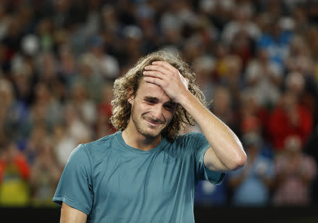 Tennis - Australian Open - Fourth Round - Melbourne Park, Melbourne, Australia, January 20, 2019. Greece’s Stefanos Tsitsipas reacts after winning the match against Switzerland’s Roger Federer. REUTERS/Aly Song
