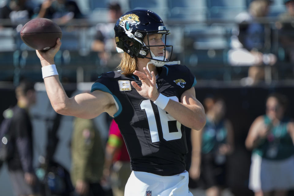 Jacksonville Jaguars quarterback Trevor Lawrence warms up before an NFL football game against the Tennessee Titans, Sunday, Nov. 19, 2023, in Jacksonville, Fla. (AP Photo/John Raoux)