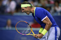 Rafael Nadal, of Spain, reacts during a match against Jack Sock, of the United States, in the Citi Open tennis tournament Wednesday, Aug. 4, 2021, in Washington. (AP Photo/Nick Wass)