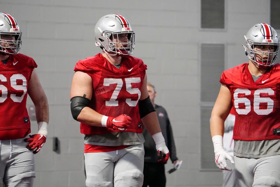Mar 7, 2023; Columbus, Ohio, USA;  Ohio State Buckeyes offensive lineman Carson Hinzman (75) lines up during spring football drills at the Woody Hayes Athletic Center. Mandatory Credit: Adam Cairns-The Columbus Dispatch