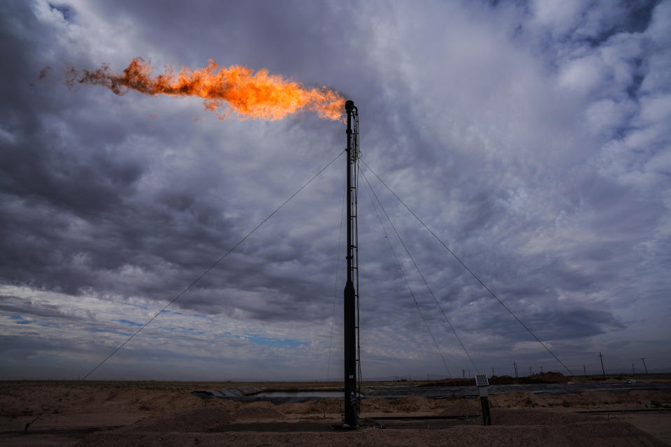 A gas flare shown here in May 2018 burns off excess gas in Midland, Texas, part of the Permian Basin, where an oil boom has remade the landscape.