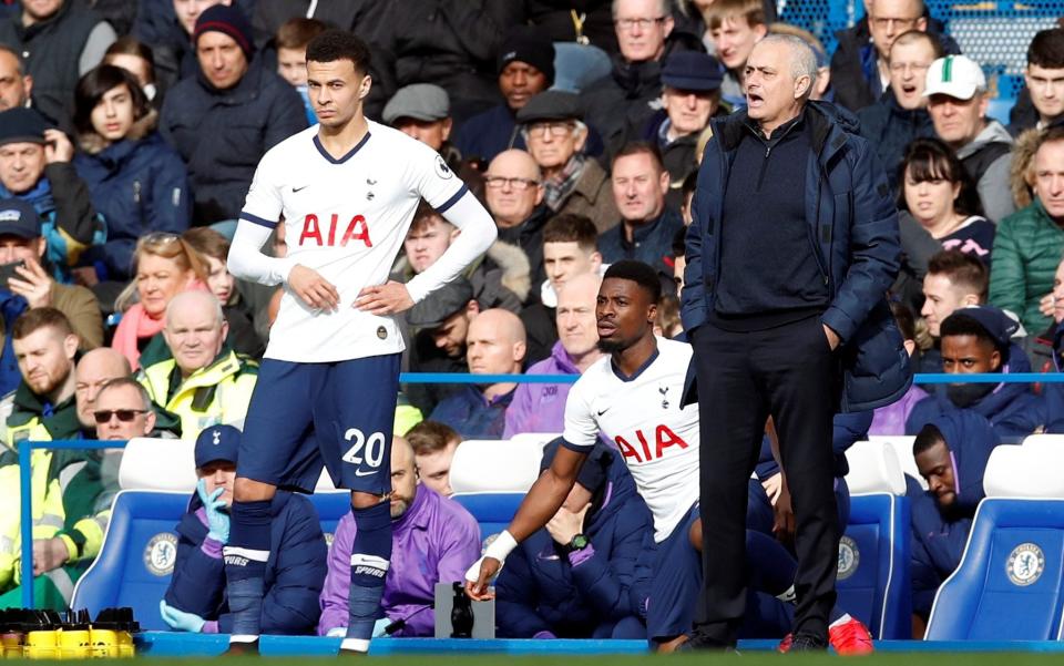 Tottenham Hotspur's Dele Alli waits to be substituted on alongside manager Jose Mourinho -  REUTERS