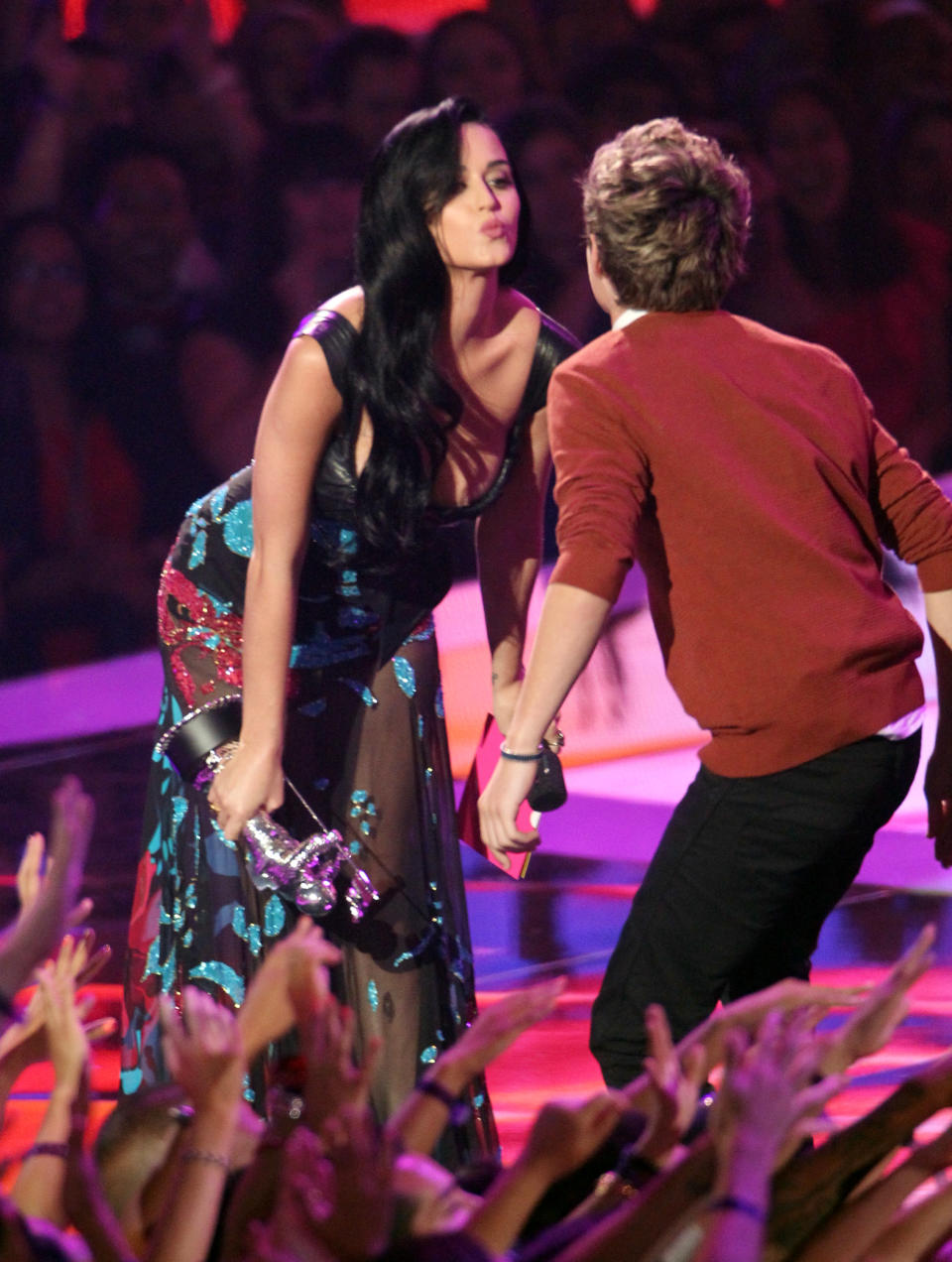 Katy Perry, left, presents the best pop video award to Niall Horan, of musical group One Direction, for "What Makes You Beautiful" at the MTV Video Music Awards on Thursday, Sept. 6, 2012, in Los Angeles. (Photo by Matt Sayles/Invision/AP)