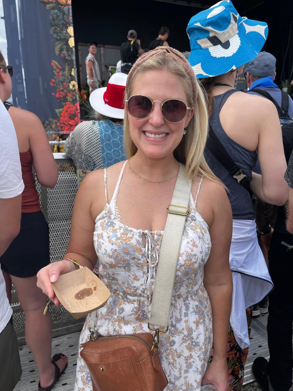 Lindsay Palsha, from Denver, Colorado, stopped by the "Boozy AF, Delicious AF, Easy AF" presentation at the Monogram Culinary Stage at Bourbon & Beyond. There, chefs Amanda Freitag and Chris Santos were serving up Parmesan fritters.