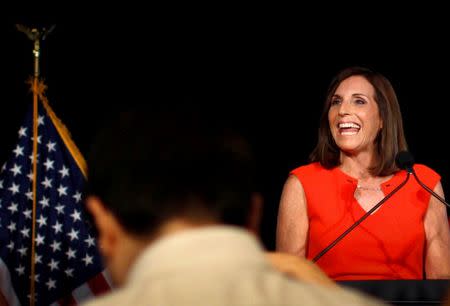 Martha McSally greets her supporters on election night after winning the Republican primary for the open U.S. Senate seat in Tempe, Arizona, U.S. August 28, 2018. REUTERS/Nicole Neri