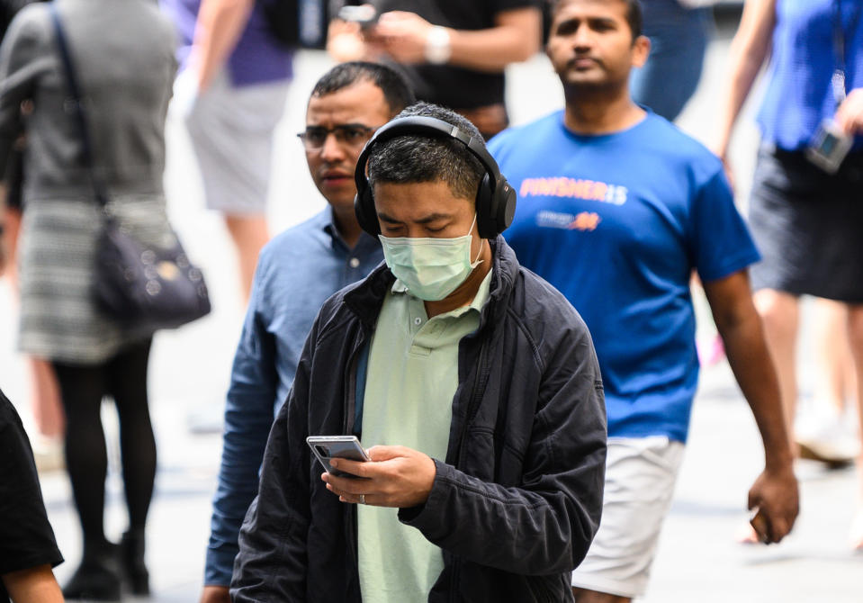 A man wearing a protective face mask seen in Sydney on Monday. Source: AAP