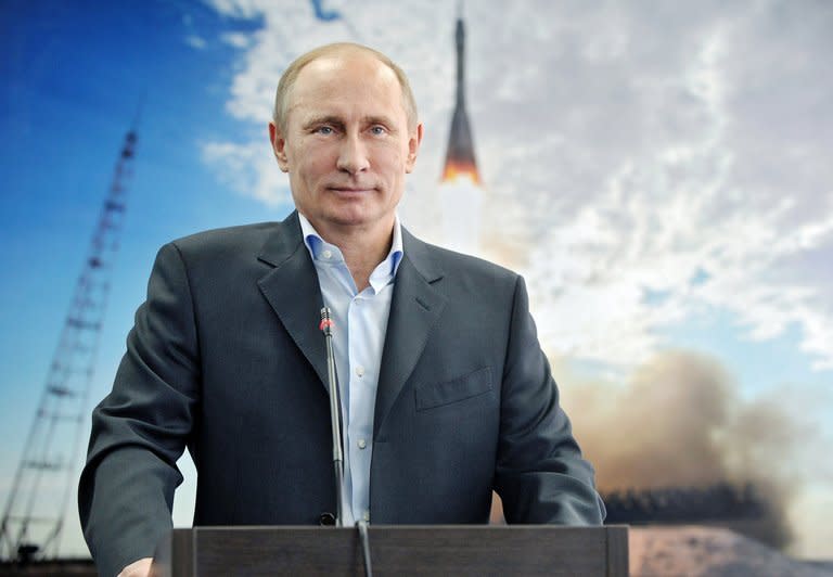 Russian President Vladimir Putin attends a live link-up with the crew of the International Space Sation (ISS) from the new Vostochny (Eastern) cosmodrome Russia is building in the Amur region of the Far East, on April 12, 2013. Putin unveiled a new $50bn drive for Russia to preserve its status as a top space power, including a new cosmodrome from where humans will fly to space