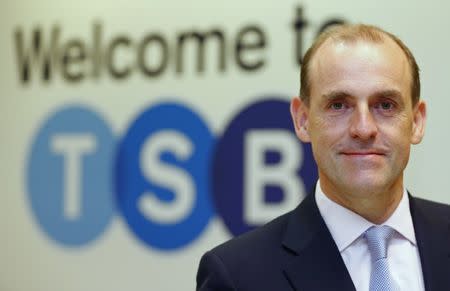 FILE PHOTO: Chief Executive of the TSB bank, Paul Pester, poses at the bank's Baker Street branch in London September 9, 2013. REUTERS/Andrew Winning