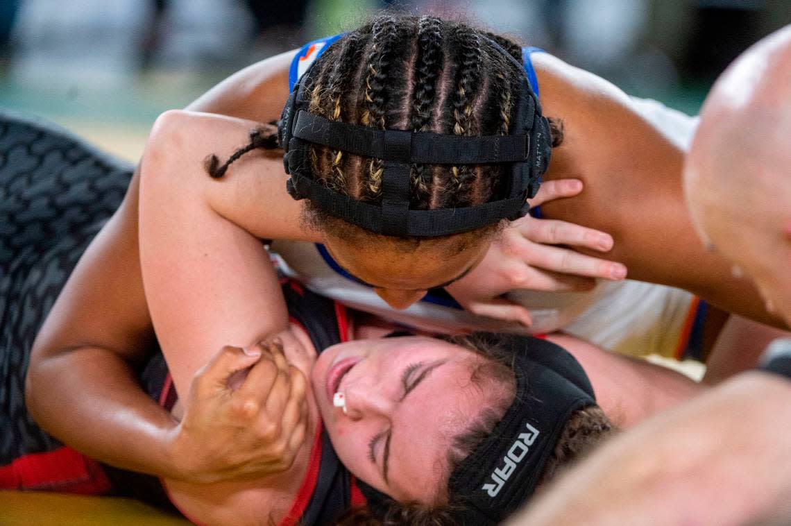Graham-Kapowsin’s Flor Parker-Borrero pins Camas’ Addie Wunderli in the 140-pound, Girls 3A/4A division’s championship match at Mat Classic XXXIV on Saturday, Feb. 18, 2023, at the Tacoma Dome in Tacoma, Wash. Parker-Borrero, a freshman, pinned Wunderli in 4 minutes, 32 seconds.