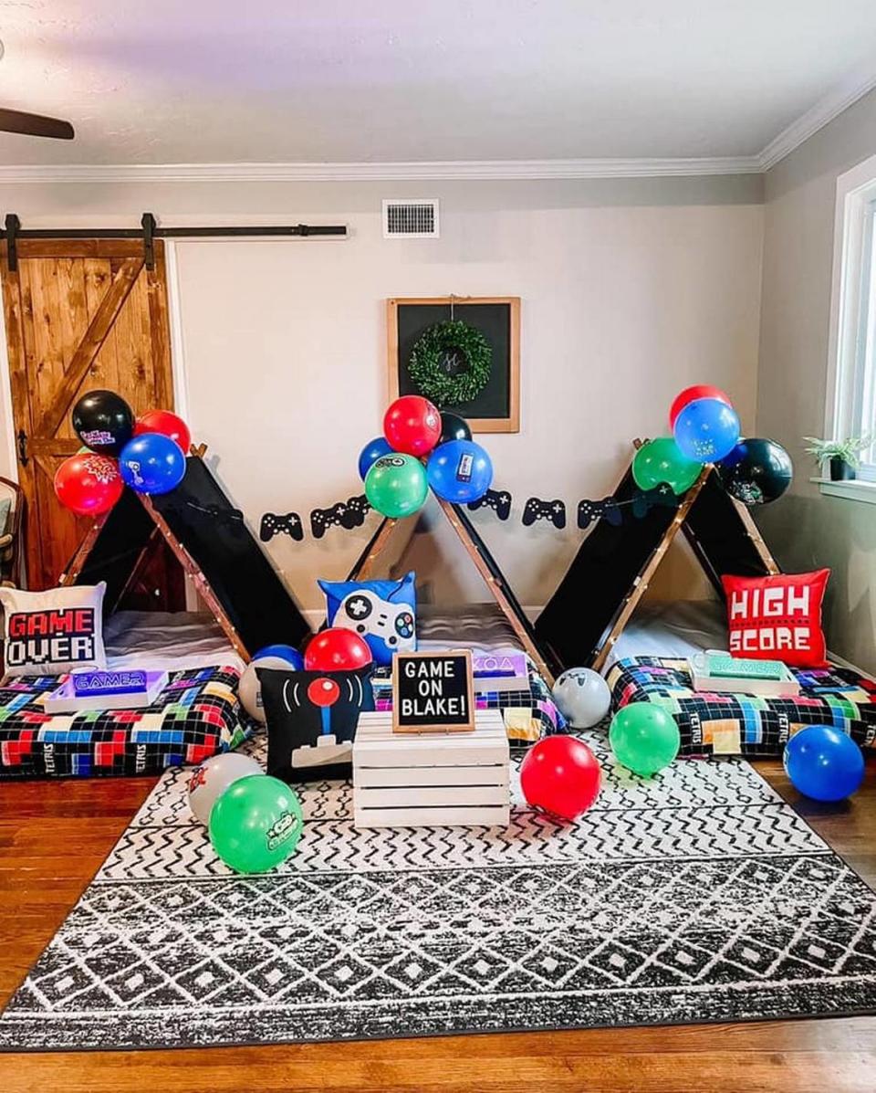 St. Pete Slumber Company decorated this room for a slumber party with a video game theme.