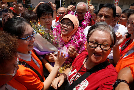 Singapore's President-elect Halimah Yacob leaves the nomination centre in Singapore September 13, 2017. REUTERS/Edgar Su