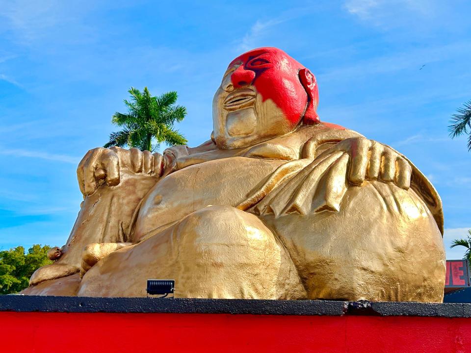 Fort Myers music venue Buddha LIVE has new owners, and they're busy making changes this week. That includes repainting the landmark Buddha statue out front. Its new gold look was almost finished Tuesday.