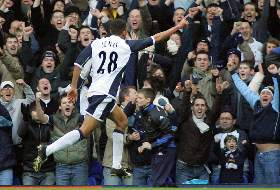 Tottenham, UNITED KINGDOM: Jermaine Jenas of Tottenham celebrates scoring their second goal against Charlton during today's Premiership clash played between Tottenham Hotspur and Charlton Athletic at Tottenham`s White Hart Lane stadium in north London, 05 February 2006. AFP PHOTO GEOFF CADDICK Mobile and website use of domestic English football pictures subject to subscription of a license with Football Association Premier League (FAPL) tel : +44 207 298 1656. For newspapers where the football content of the printed and electronic versions are identical, no licence is necessary. (Photo credit should read Geoff Caddick/AFP via Getty Images)