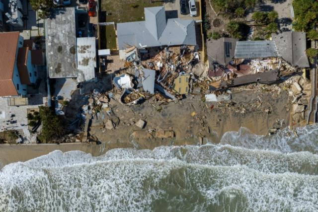 An aerial view of destroyed beachfront homes in the aftermath of Hurricane Nicole at Daytona Beach, Florida, on November 11, 2022