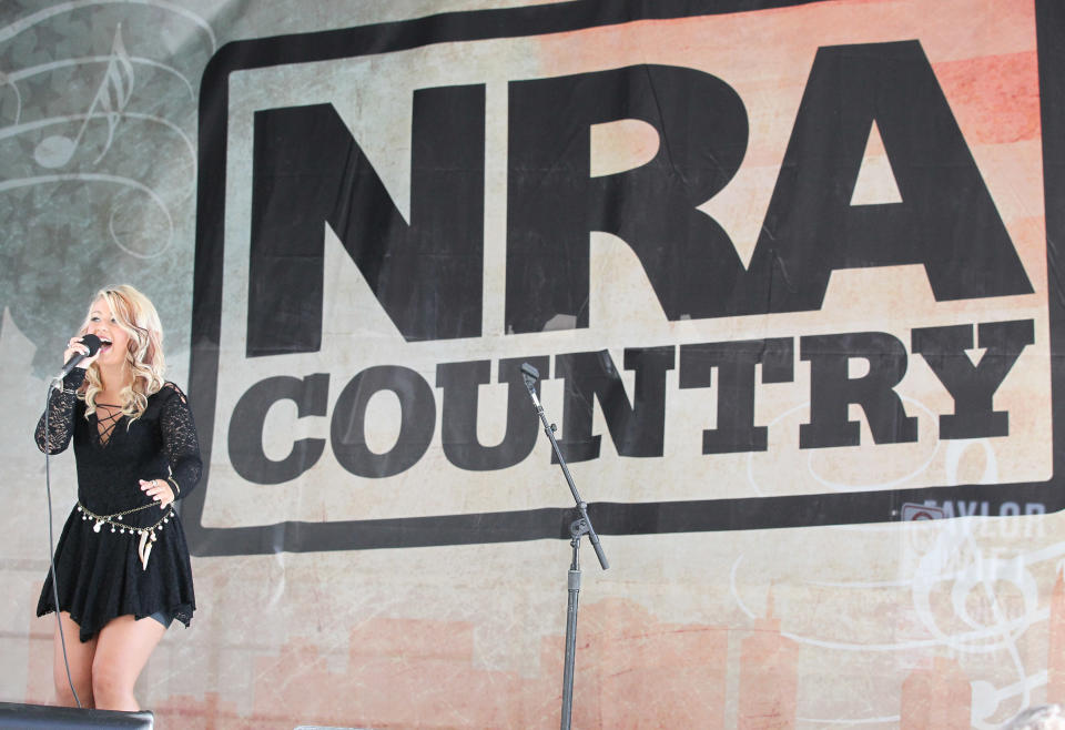 Abbi Scott performs at the NRA 2015 annual meeting on April 12, 2015, in Nashville, Tenn. (Photo: Terry Wyatt/Getty Images)