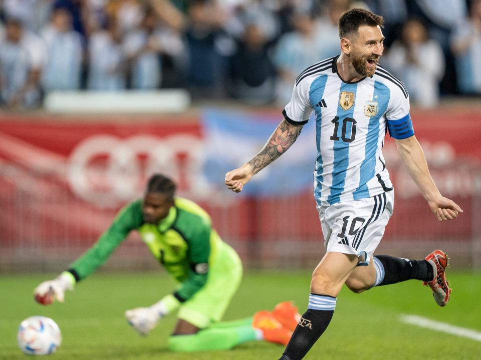 Lionel Messi (10) of Argentina celebrates scoring a goal during a friendly football game against Jamaica at Red Bull Arena. Argentina won 3 - 0. Friendly game played in preparation for the World Cup to be held in Qatar in November 2022. Three intruders were apprehended by security personnel after they invaded the pitch during the game trying to reach Lionel Messi of Argentina.