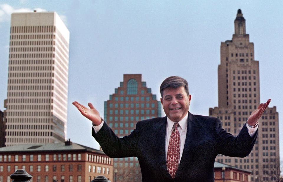 FILE - In this October 1998 file photo, Providence Mayor Vincent "Buddy" Cianci Jr., poses before the city skyline in Providence, R.I. "The Prince of Providence," a new stage play about the late mayor opens Sept. 12, 2019. Cianci died Jan. 28, 2016, in Providence at age 74. (AP Photo/Matt York, File)