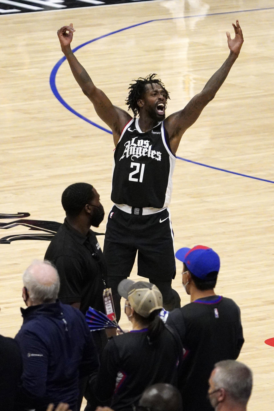 Los Angeles Clippers guard Patrick Beverley celebrates in the closing seconds during the second half in Game 6 of a second-round NBA basketball playoff series against the Utah Jazz Friday, June 18, 2021, in Los Angeles. (AP Photo/Mark J. Terrill)