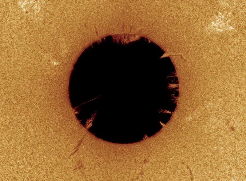 A photo of the Sun, inverted onto polar coordinates.